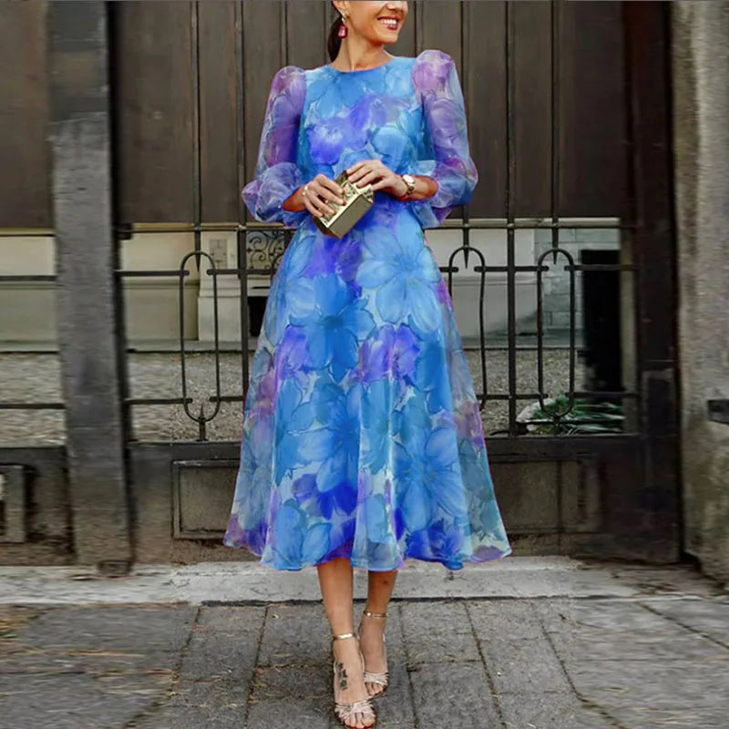 Aria | Bloemenprint midi jurk met flatterend silhouet 1