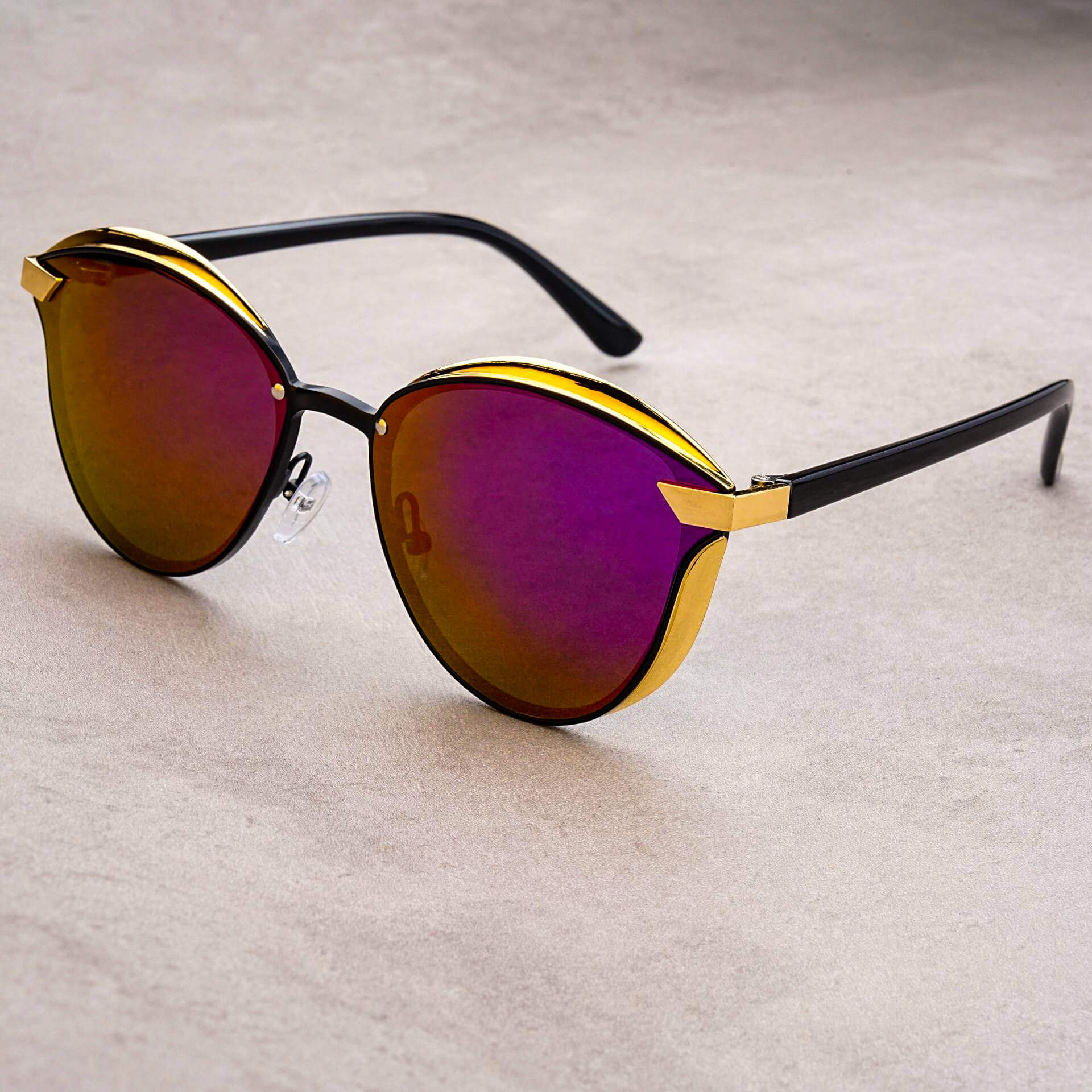 Navando | Oversized Ronde Zonnebril Met Gouden Details