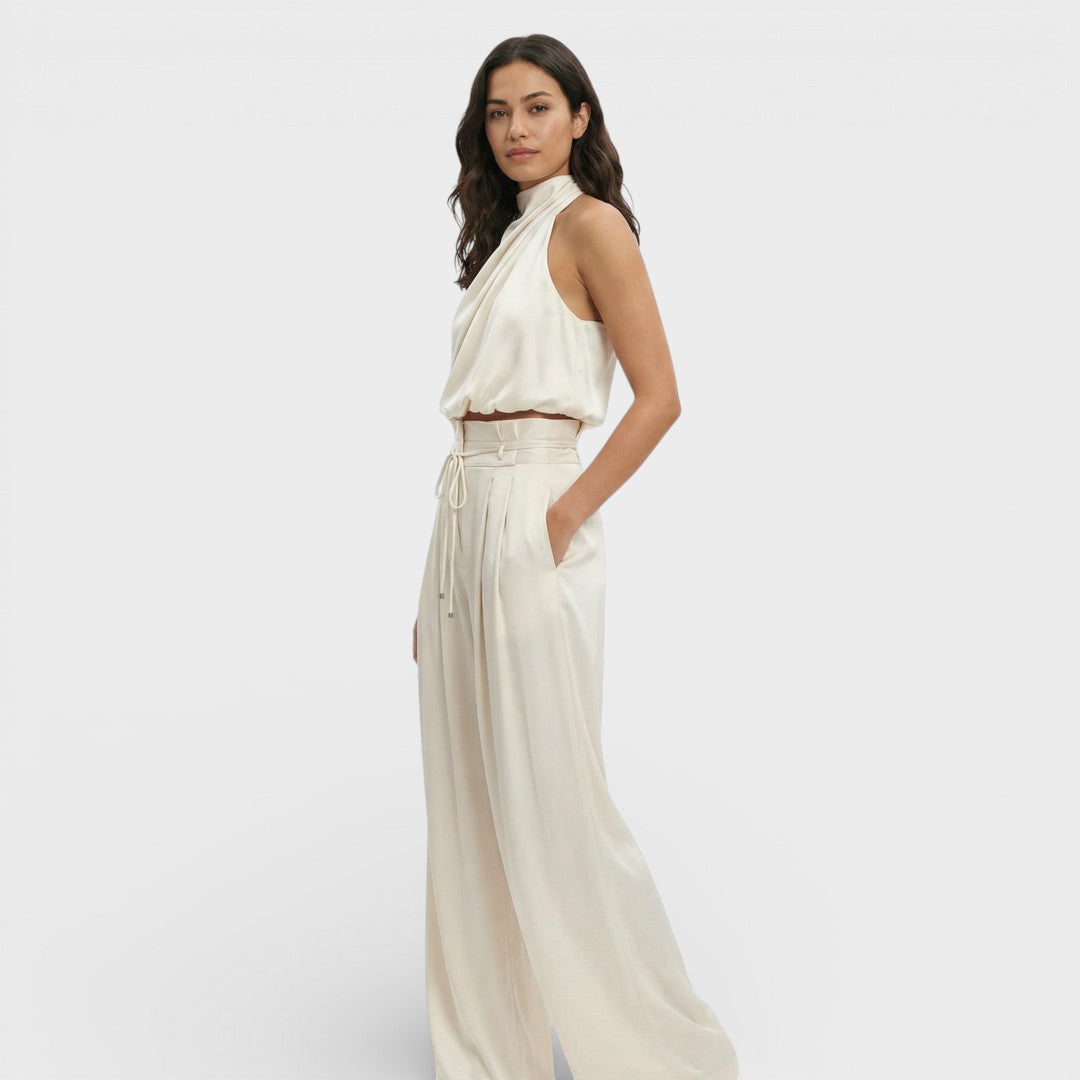 Onbekend | Lange mouwloze zwarte jumpsuit met gedrapeerde kraag 0