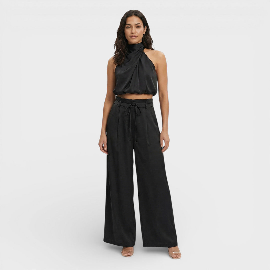 Onbekend | Lange mouwloze zwarte jumpsuit met gedrapeerde kraag 4