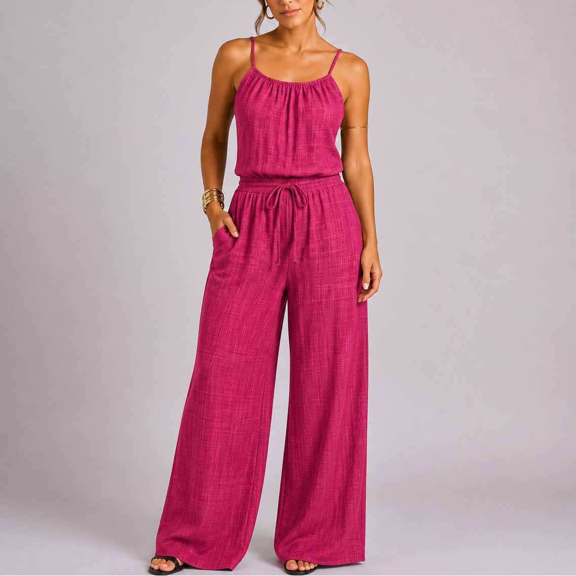 Lynn | Jumpsuit dames met spaghettibandjes en wijde pijpen - Roze