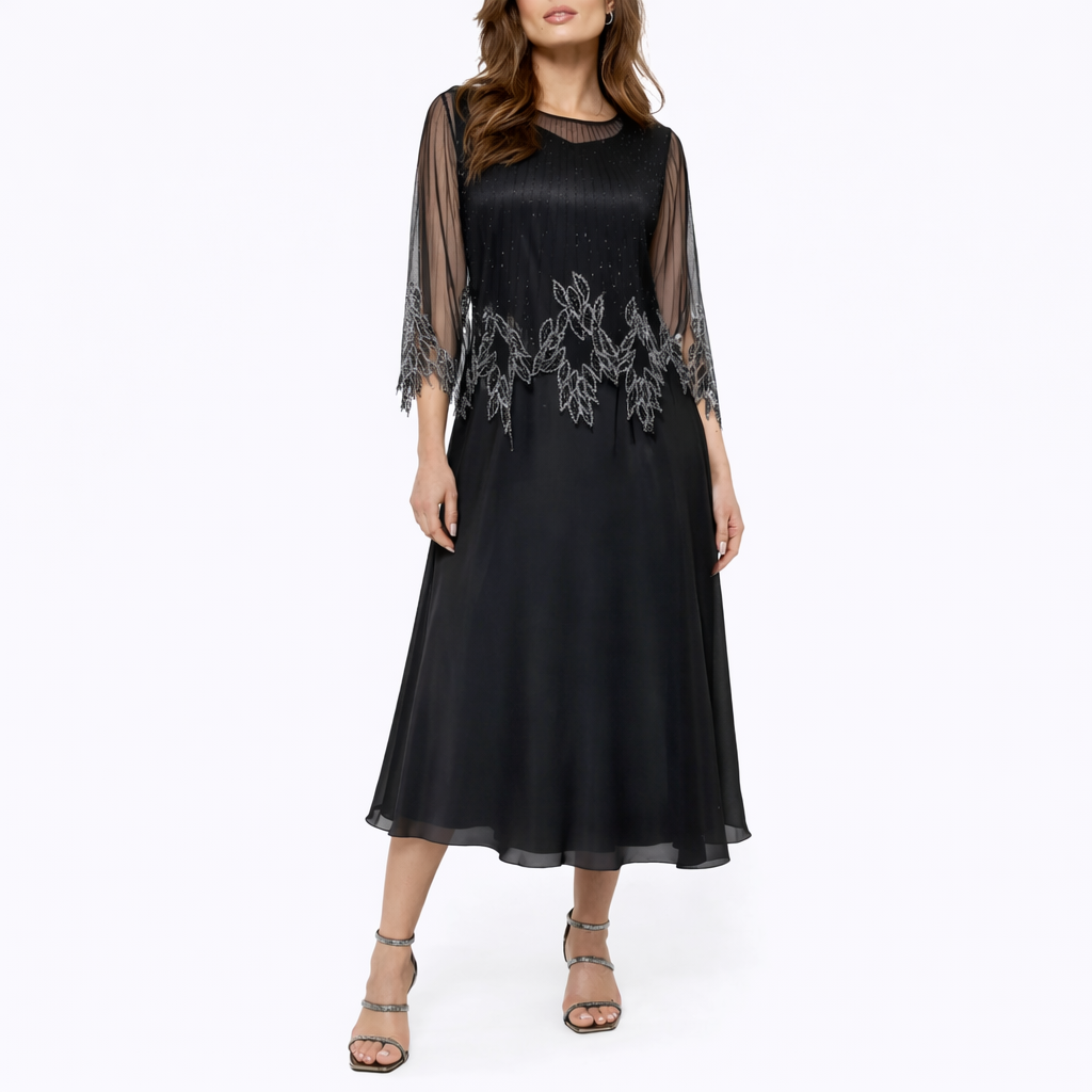 Maaike | Elegante midi jurk met doorschijnende mouwen - Zwart