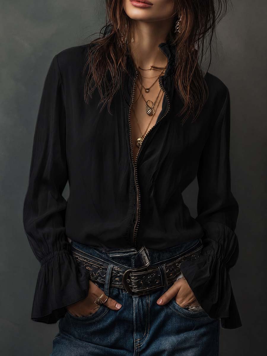 Zoë | Getailleerde blouse met ruche manchetten - zwart