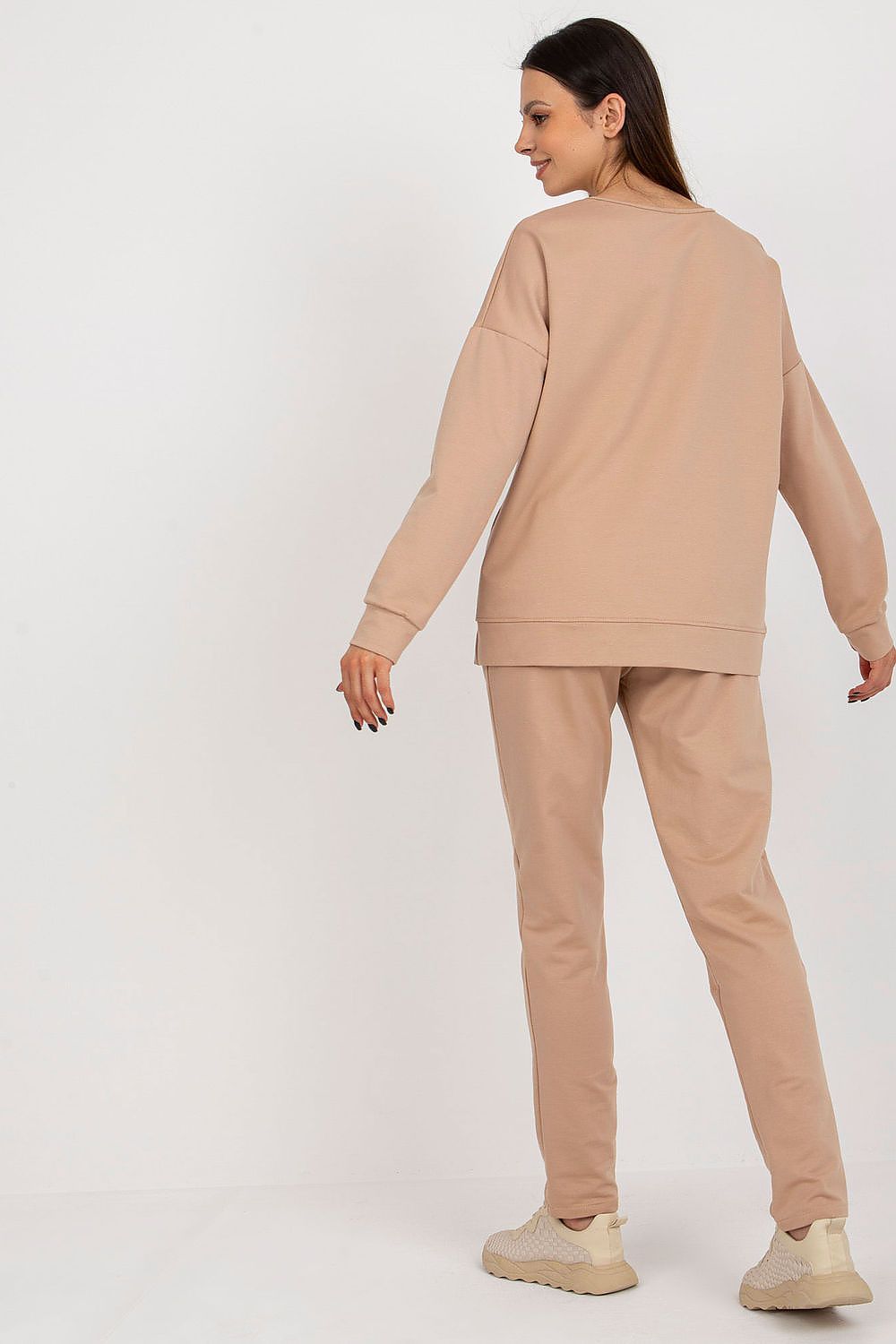 Evy | Oversized sweater met knoopaccenten en slim fit broek loungewear set 2