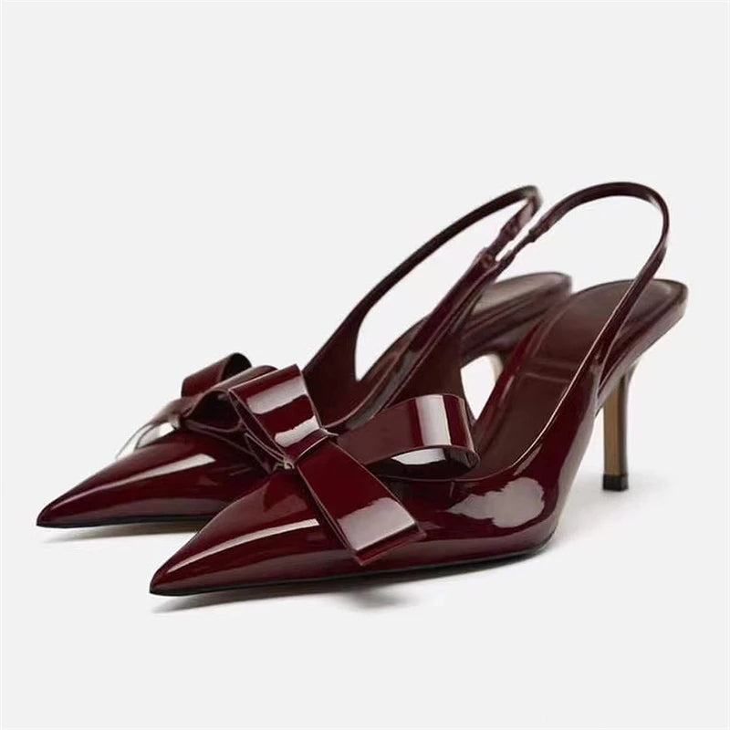 Karmijn | Transparante pumps met strikdetail 2