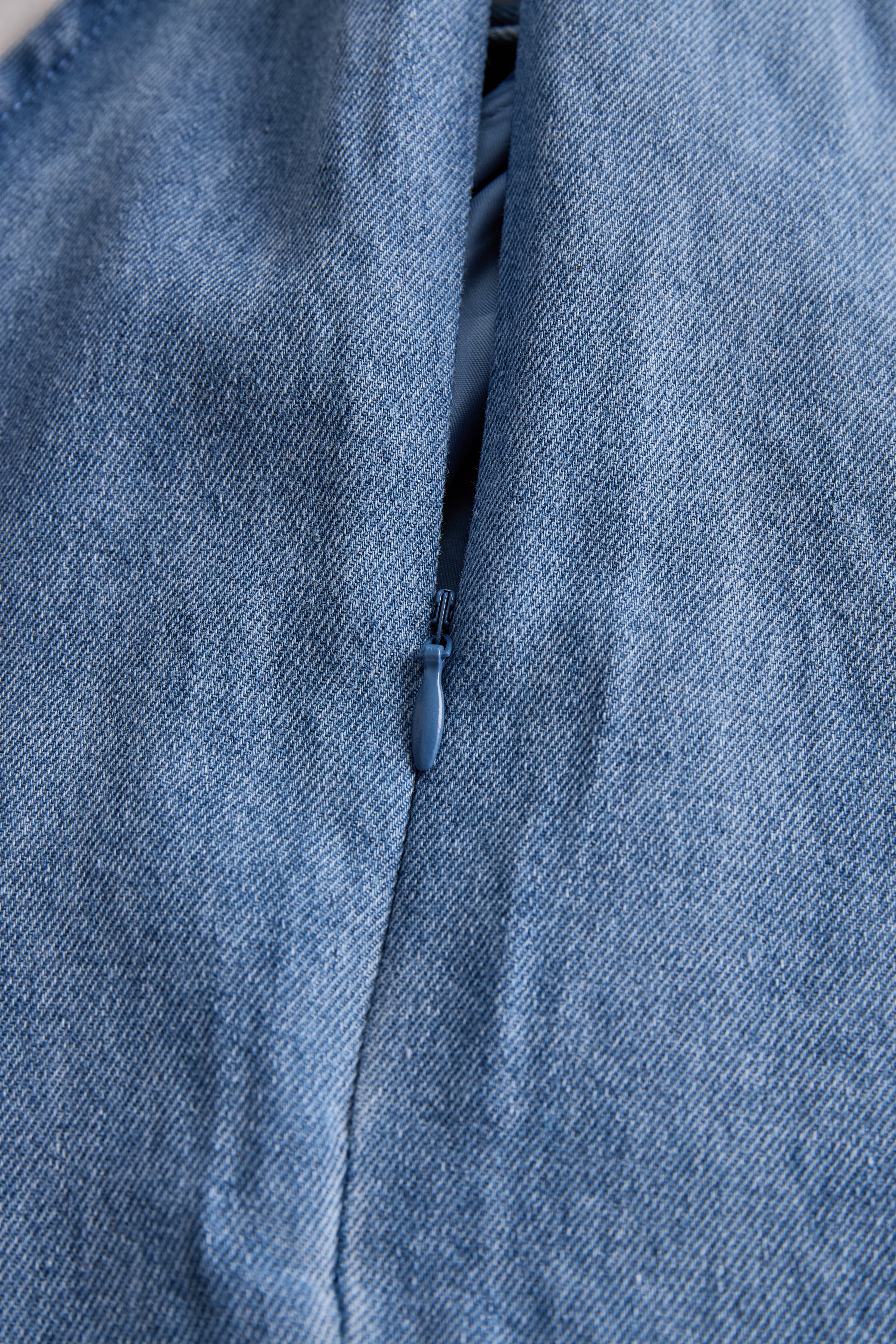 Navando | Mouwloze Halter Blouse Met Strikdetail