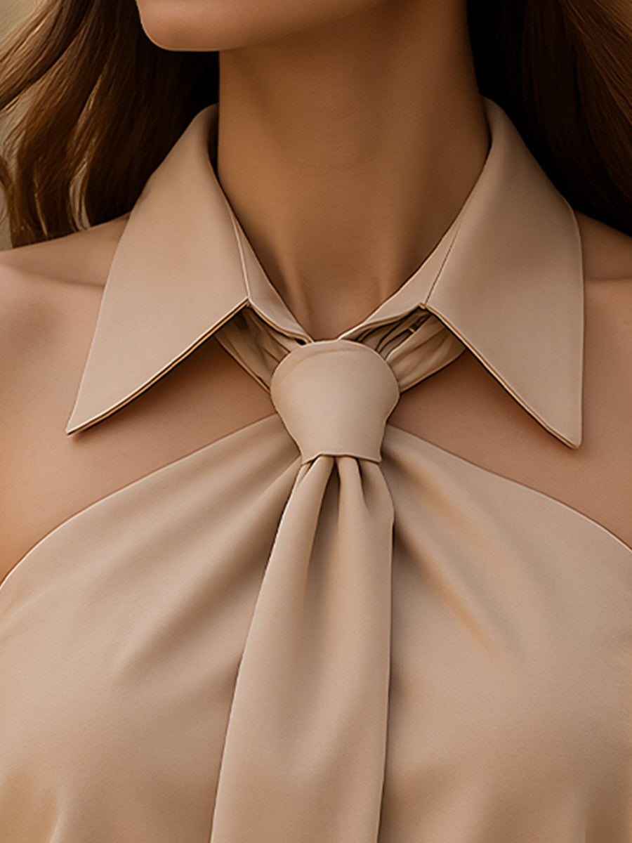 Navando | Mouwloze Halter Blouse Met Strikdetail