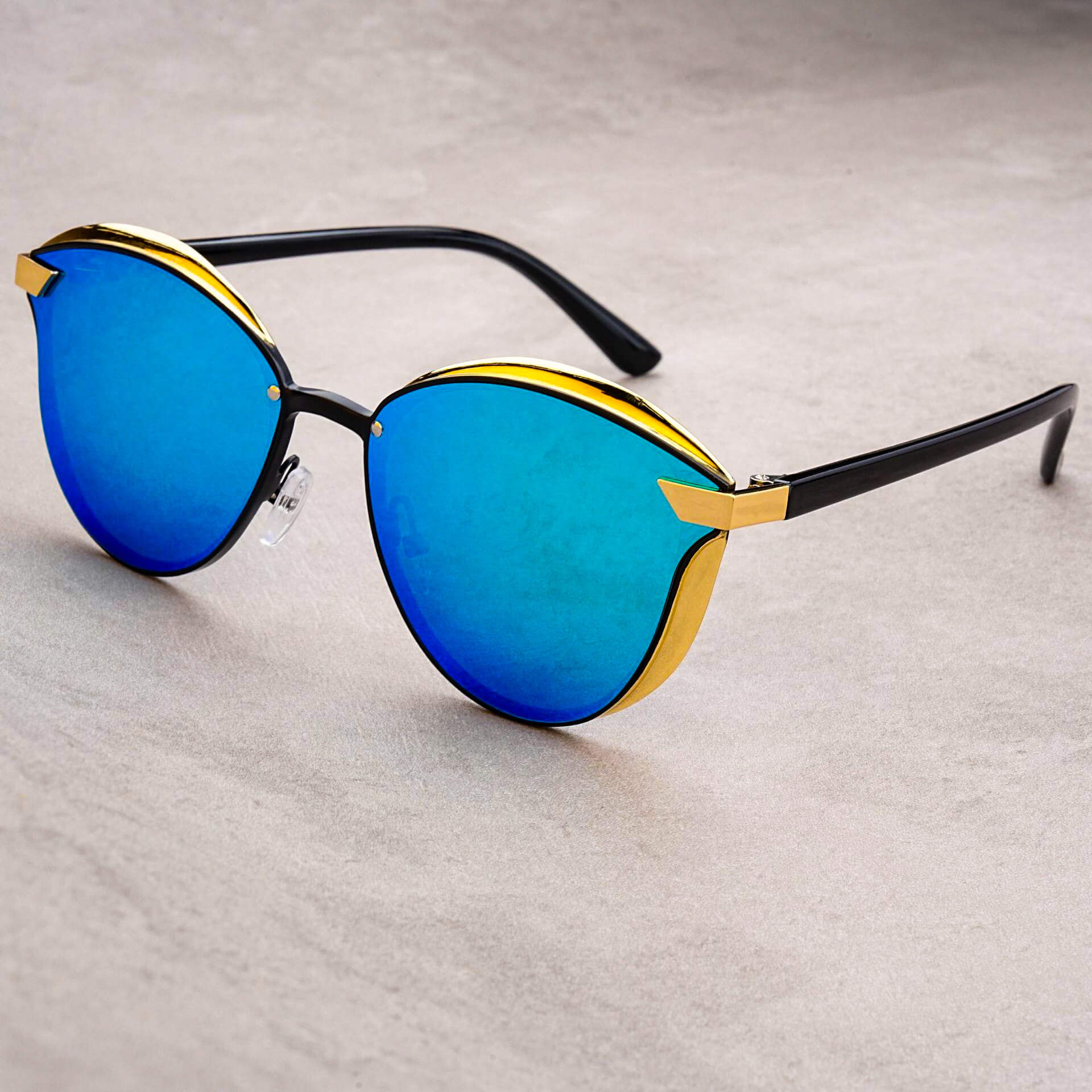 Navando | Oversized Ronde Zonnebril Met Gouden Details