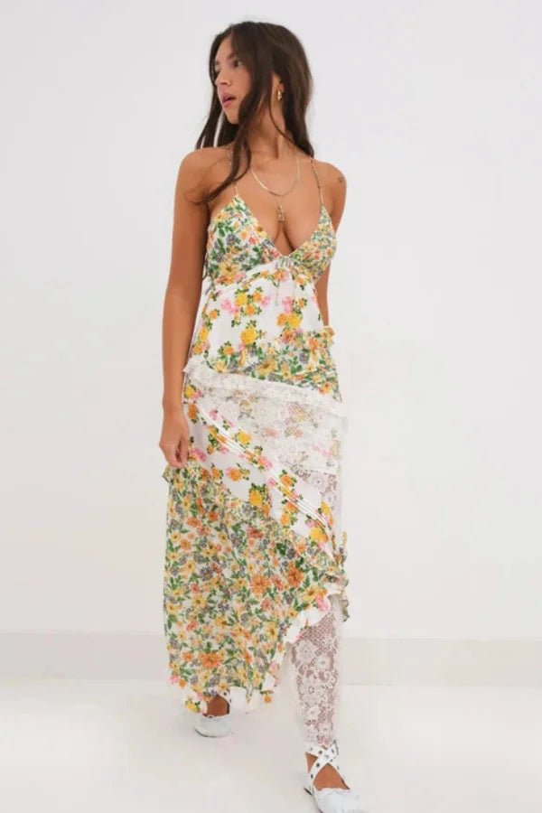 Rosalie | Gelaagde jurk met diepe halslijn en ruchedetails 0
