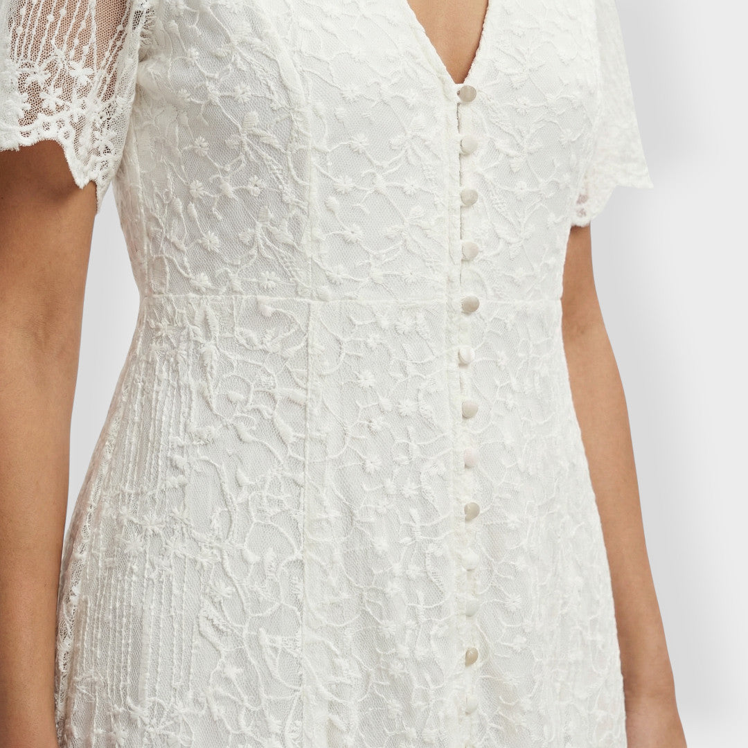 Witte jurk | V-hals, kanten accenten, vloeiend silhouet 2