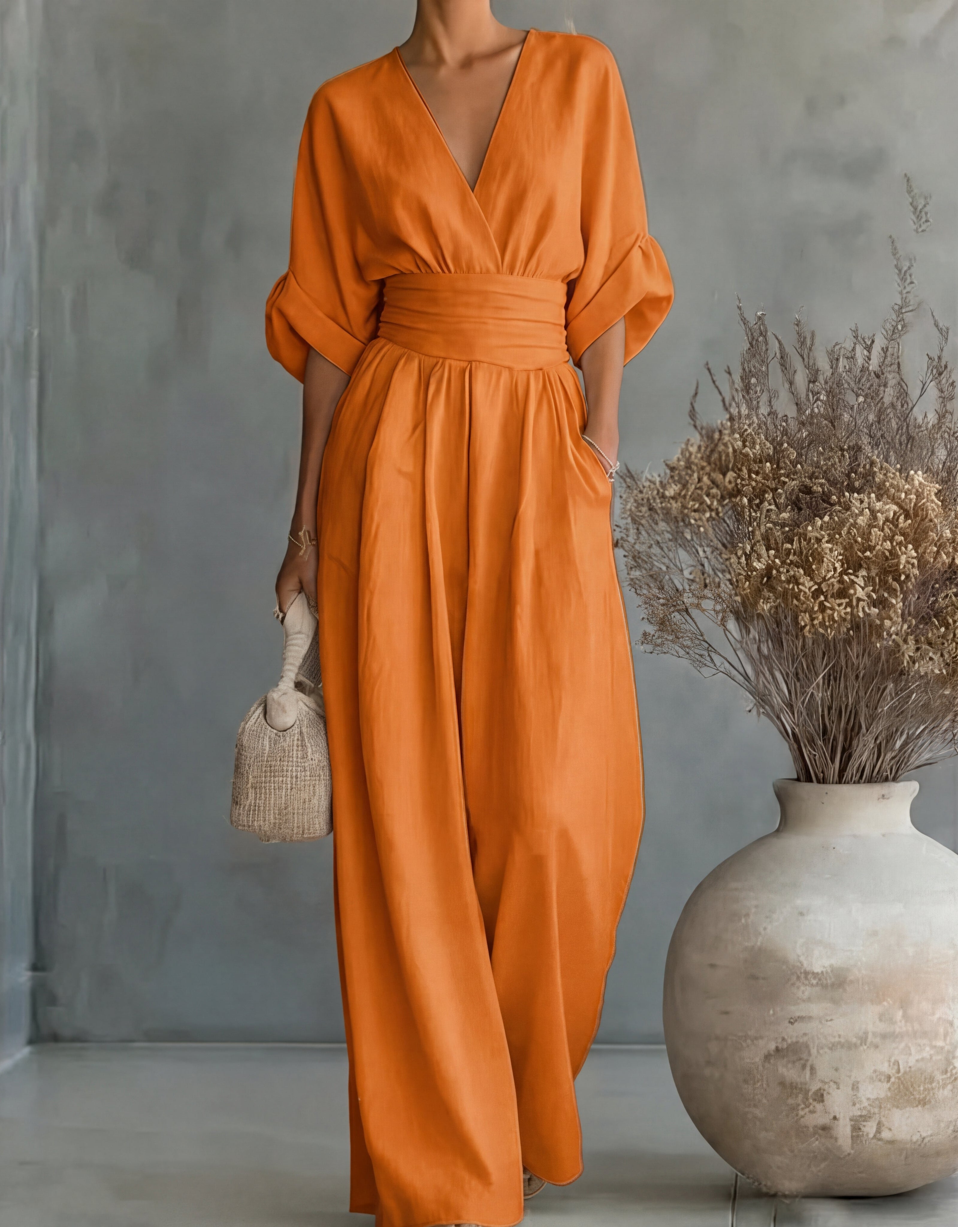 Bregje | Wijde jumpsuit voor dames met V-hals - Oranje