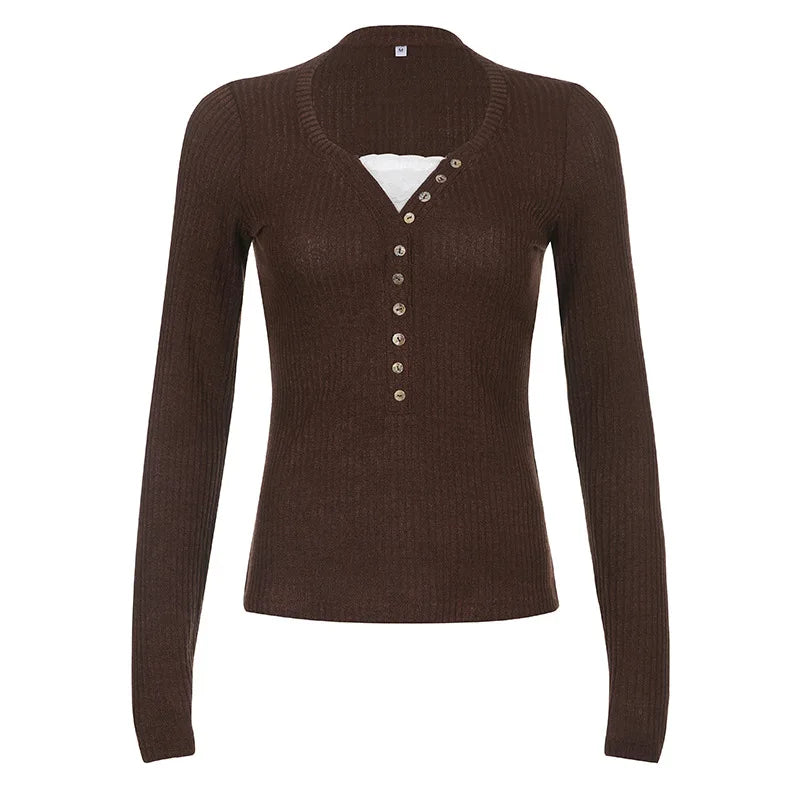 Britt | Getailleerde gebreide top met lange mouwen - Zwart